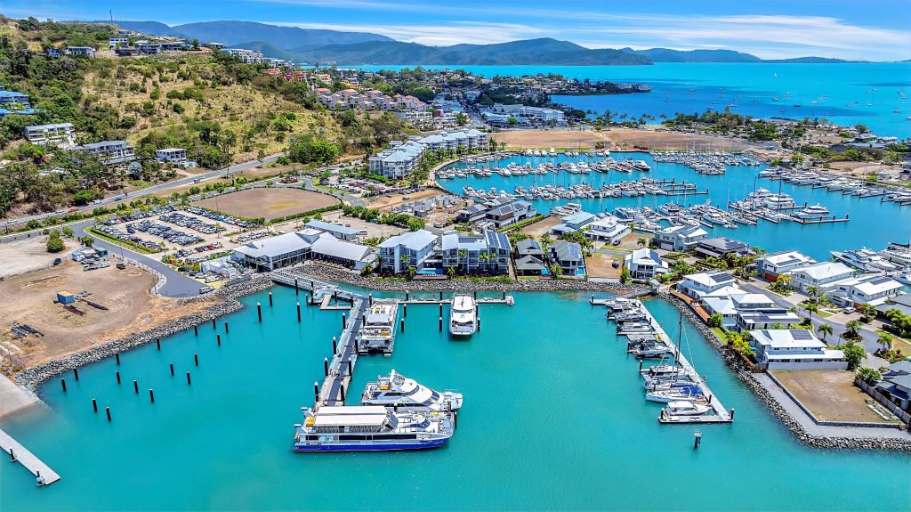 New owners of Port Airlie marina sail into the sunset $20.7 million lighter