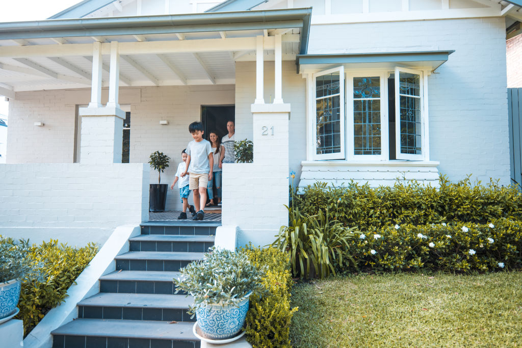 Family leaving out front of home.